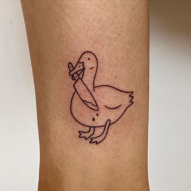 duck with knife tattoo